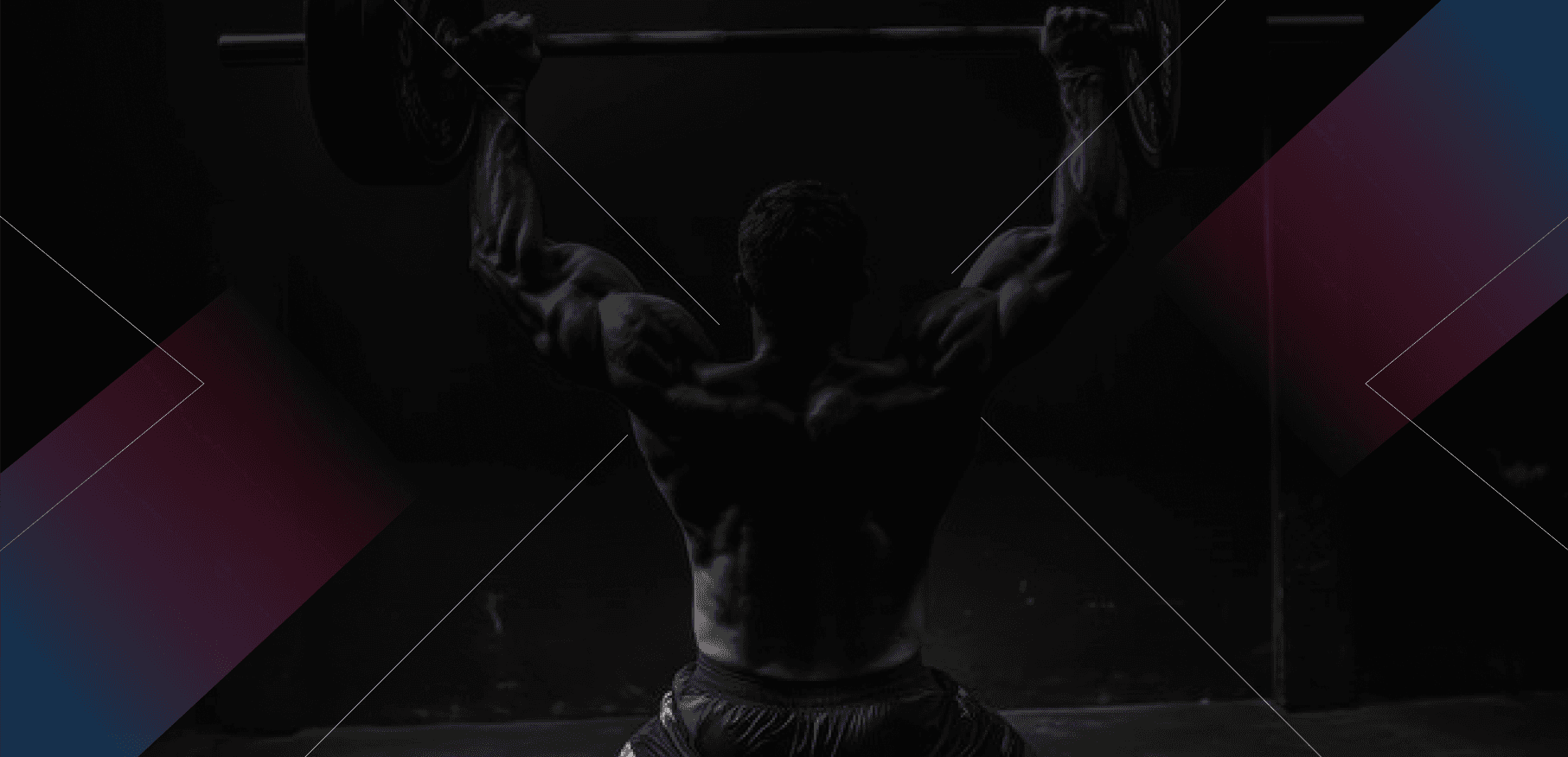 Bodybuilder showing muscular back in gym